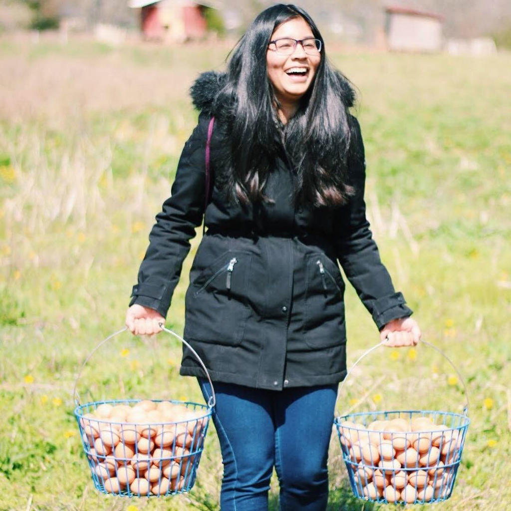 Soulin Reyes during a startup trip to Whiffletree Farm after collecting pasture raised eggs. 