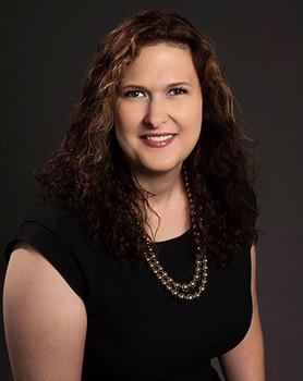 C. Kat Grimsley, director of the Masters in Real Estate Development program at Mason